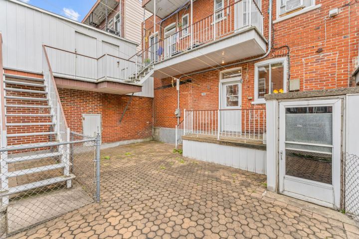 Face arrière et garage – triplex à vendre, 7959-7963 rue Lajeunesse, Montréal